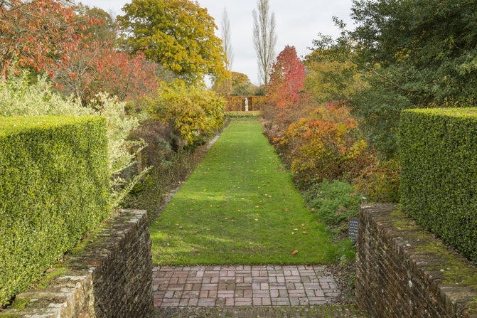 The Moat Walk in Autumn at Sissinghurst Castle Garden